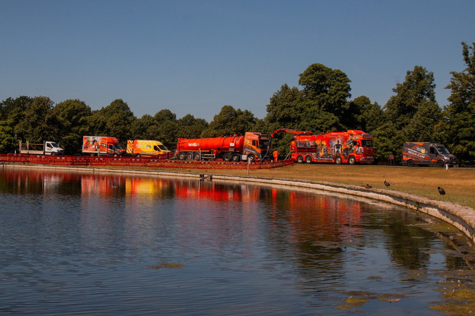Heavy-duty tanker being transported across UK motorway