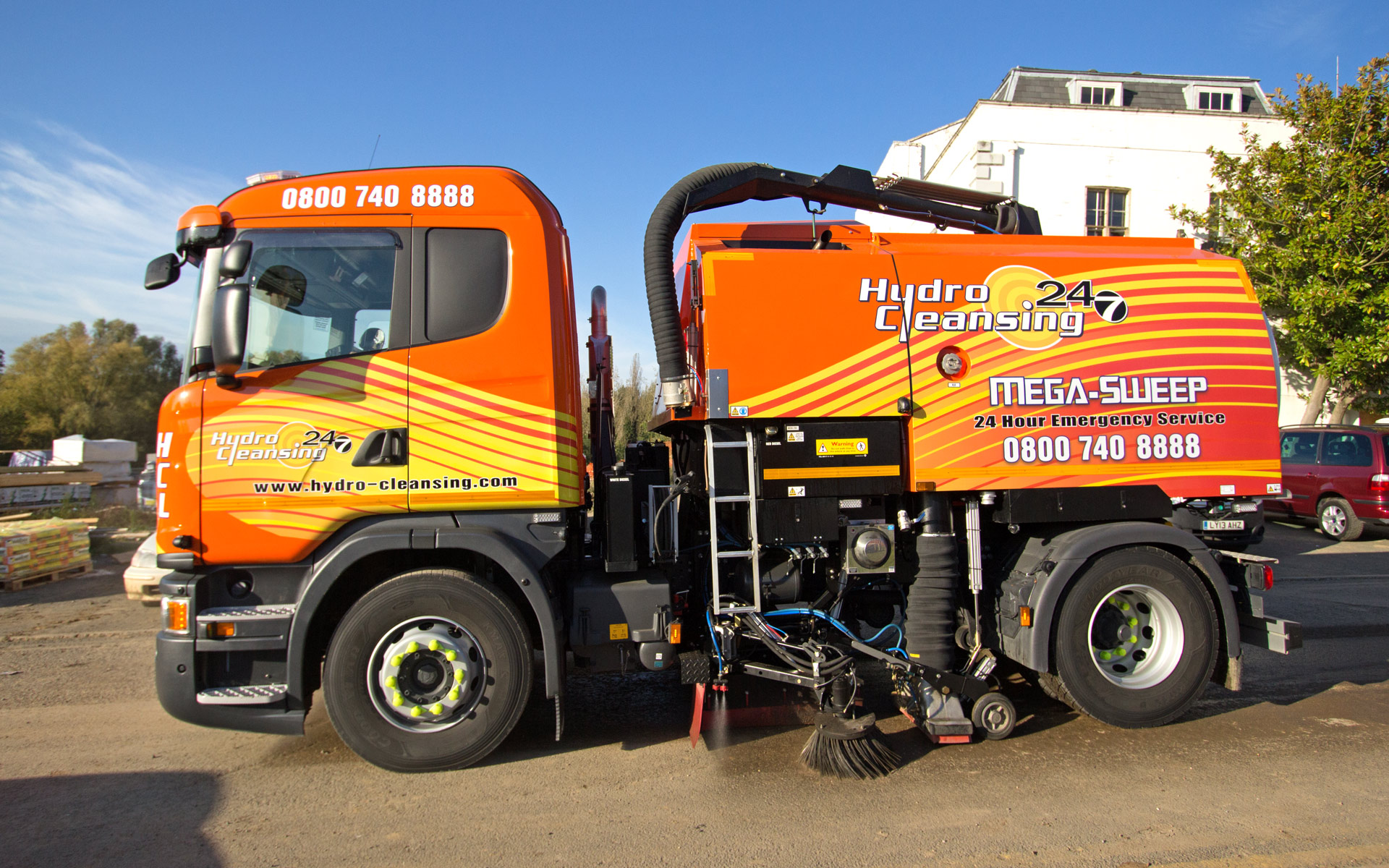 Sweeper truck on road