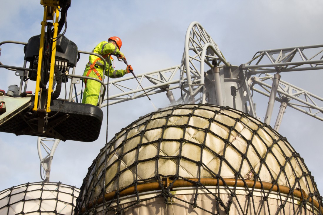 Engineer handling Mega-Reel during pipe survey