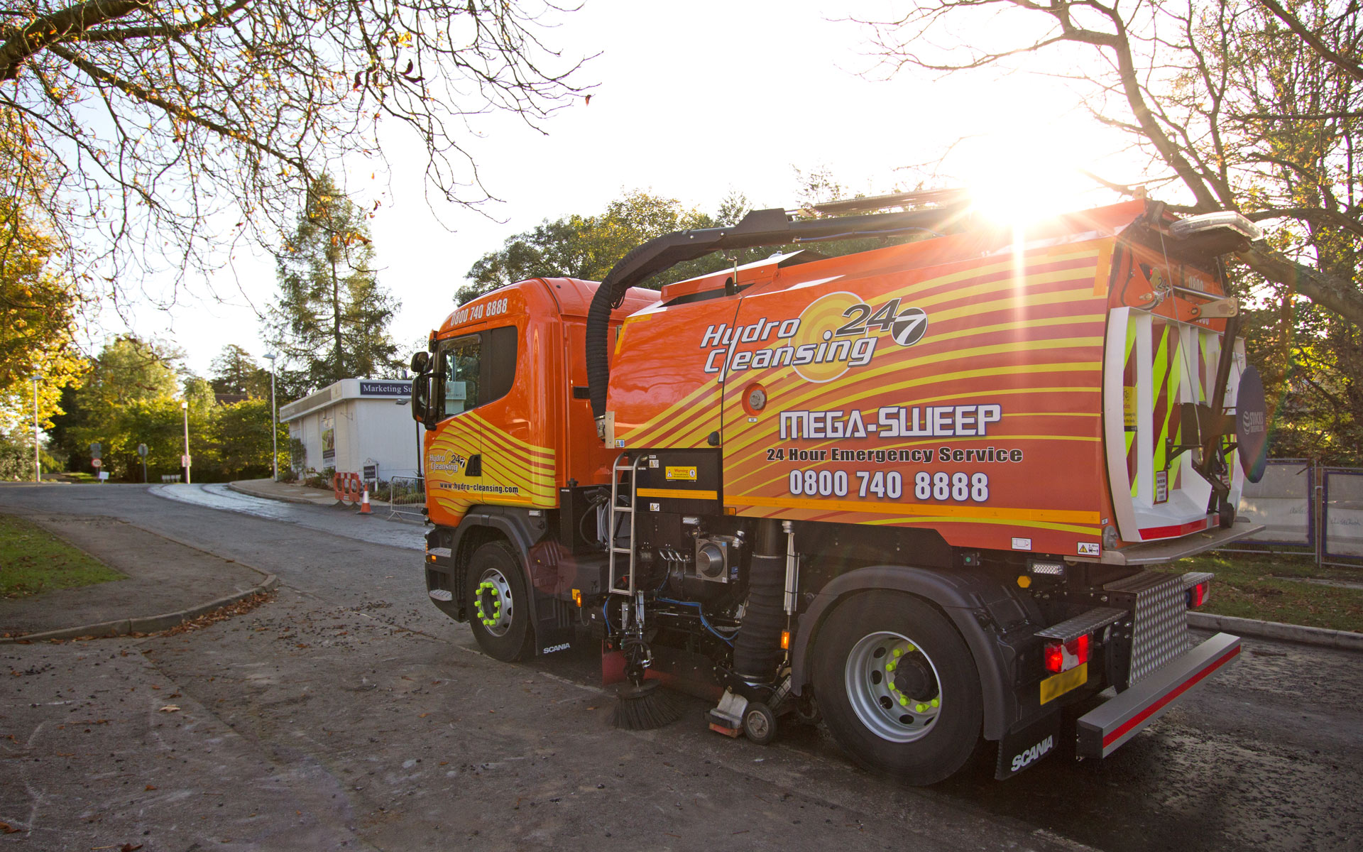 Operator controlling Mega-Sweep road sweeper