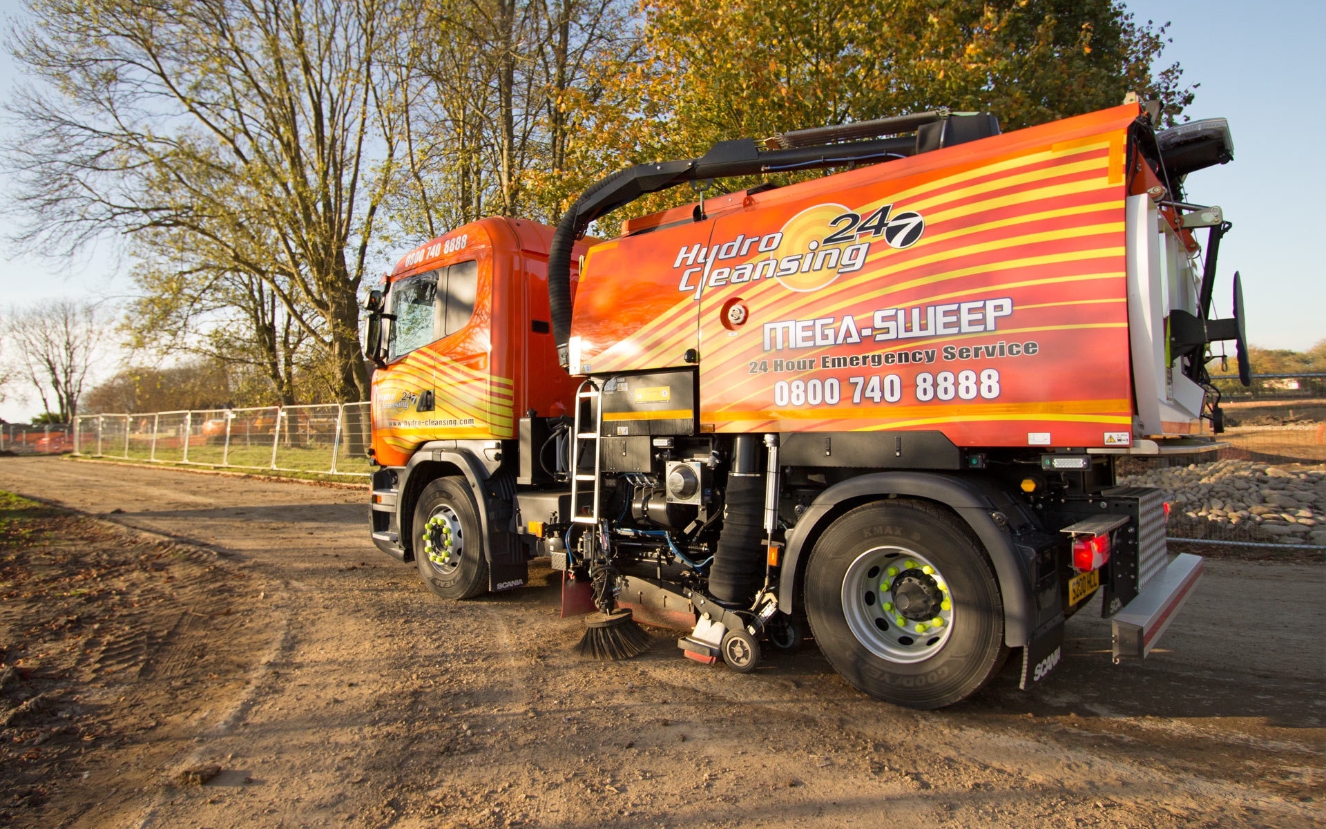 Accident clean-up service with road sweeper
