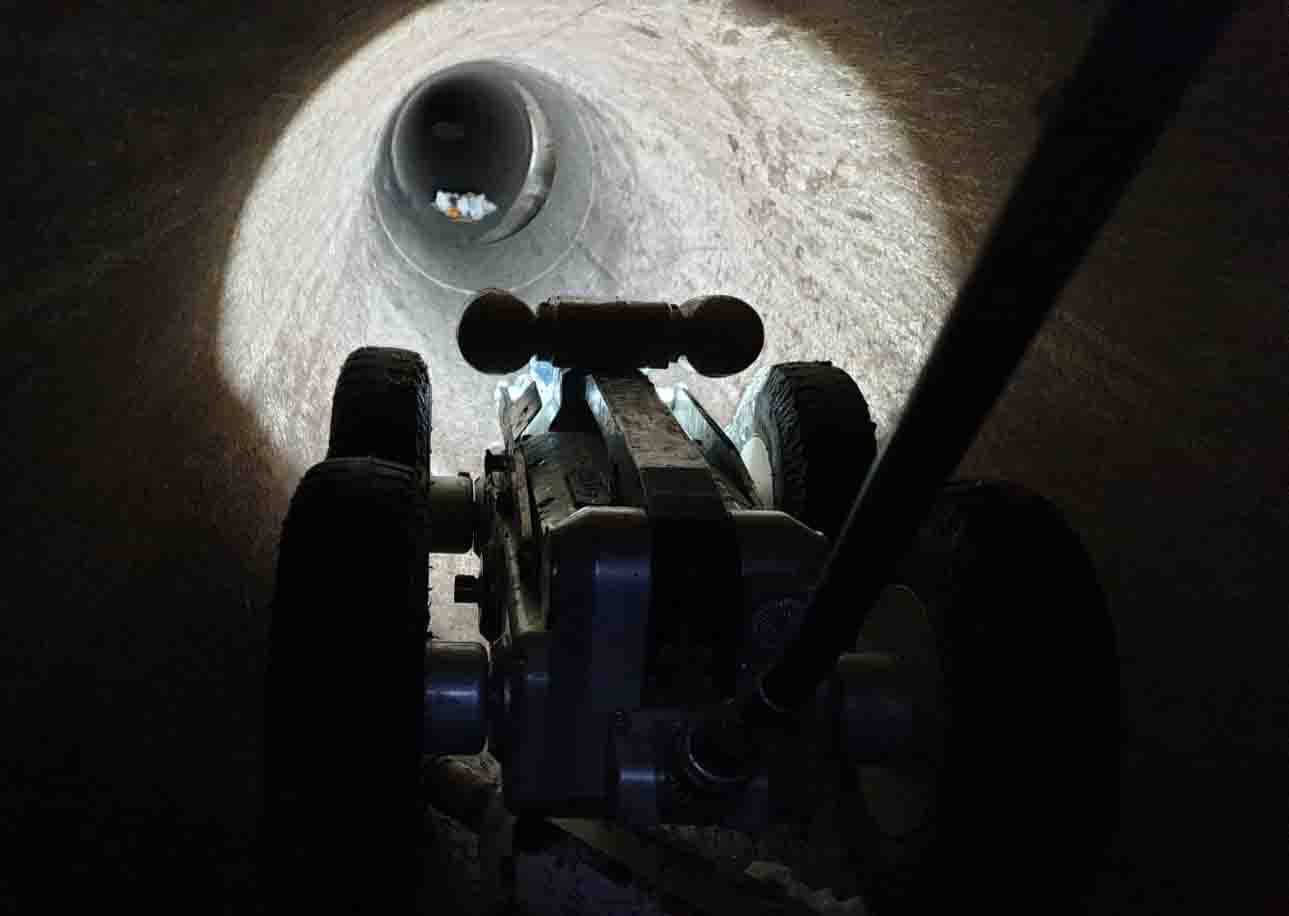Engineer handing over completed WinCan report