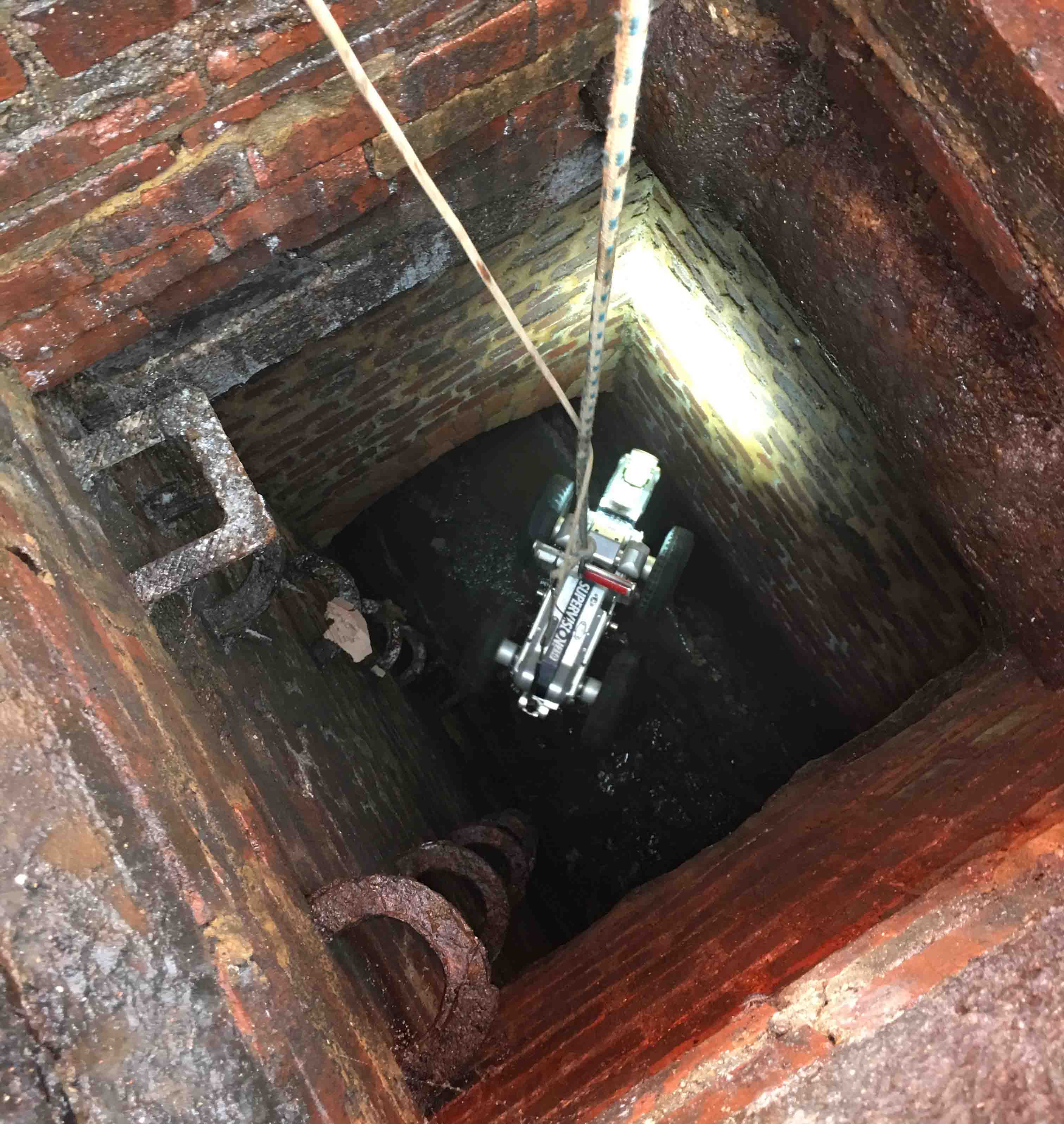 Finalised drain inspection paperwork with compliance stamp